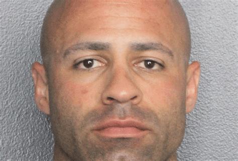 Miami-Dade police officer arrested after allegedly throwing cheeseburger at and punching wife